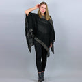 Poncho da donna con fasce di lurex oro e frange nero