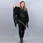 Poncho da donna con fasce di lurex oro e frange nero