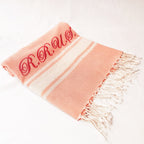 Telo mare rosa salmone a righe in cotone da personalizzare