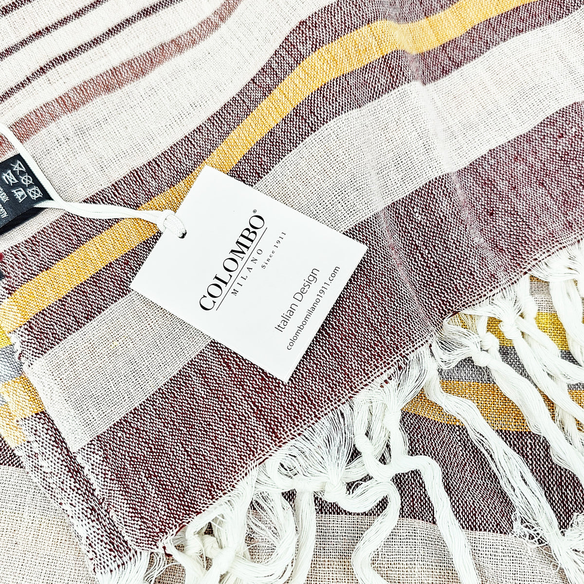 Telo mare burgundy a righe in cotone dettaglio