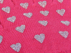 dettaglio guanti da bimba rosa con cuori glitter argento
