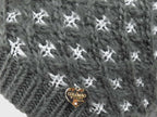 Dettaglio cuoricino - cappello a intreccio con lurex argento