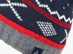 Dettaglio  - cappello jacquard da bimbo con pompon e motivi geometrici
